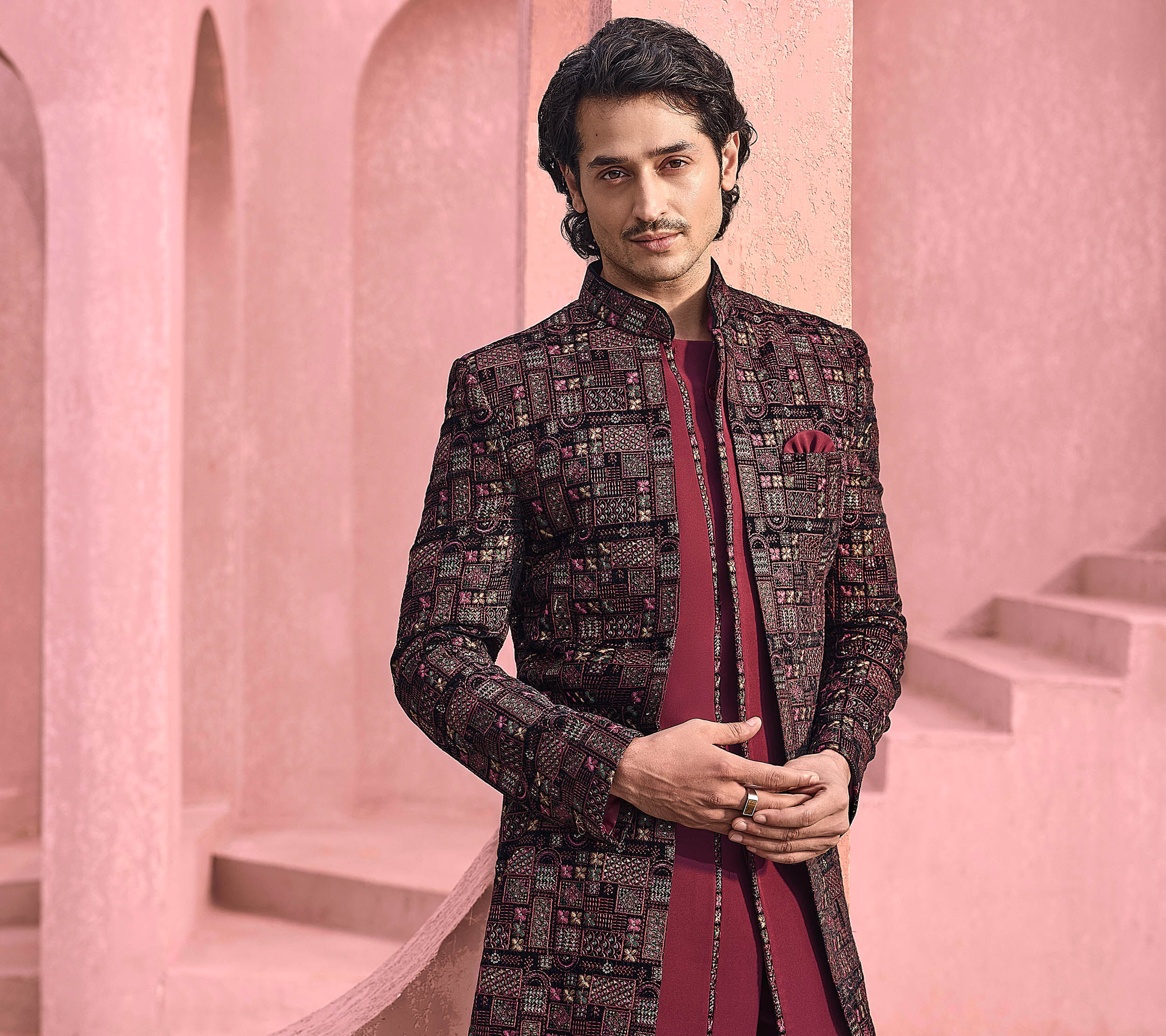 Elegant red Jodhpuri suit for groom's wedding attire